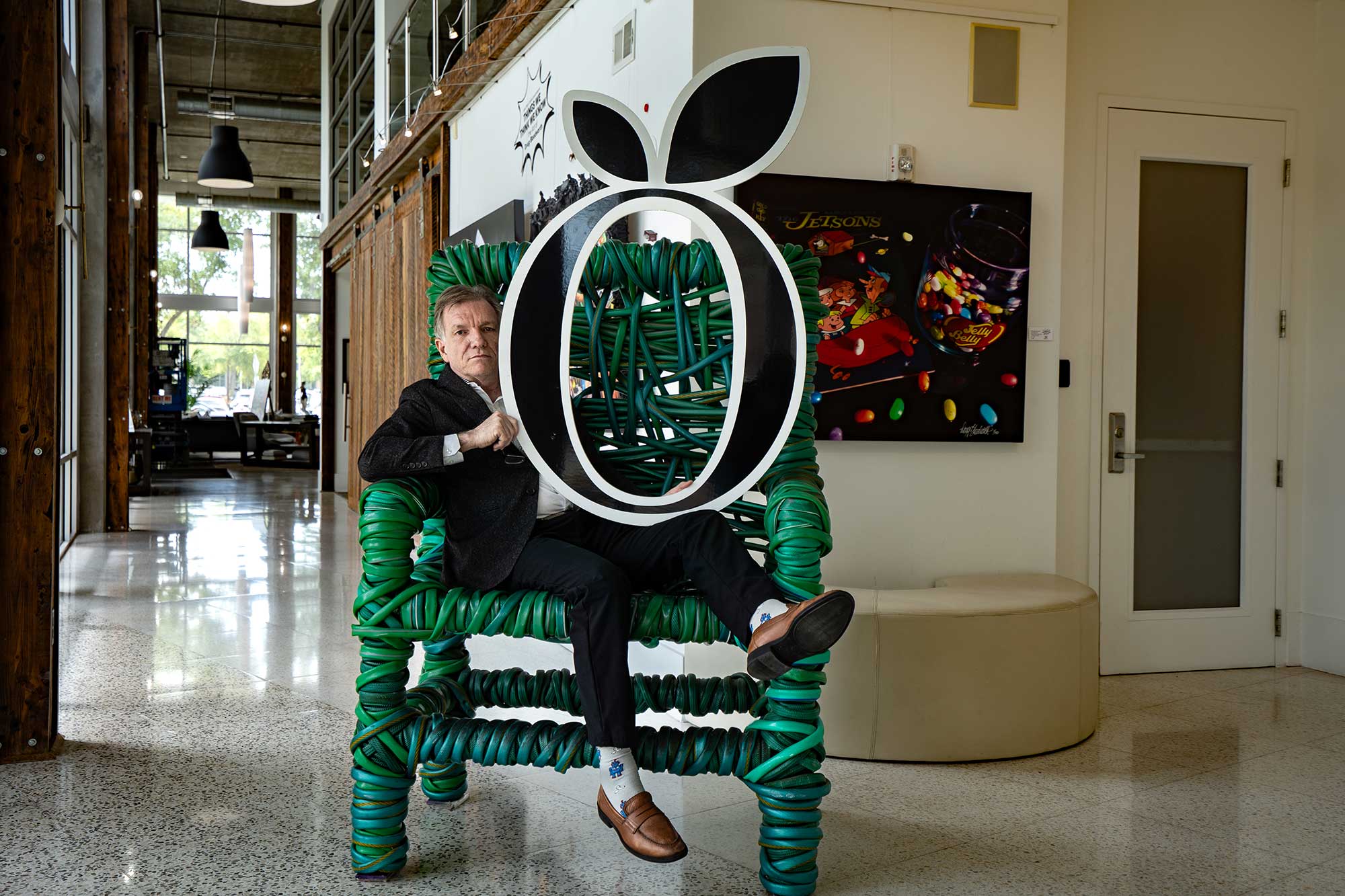 Boris Garbe holds the Orlando Life O at Mills Gallery